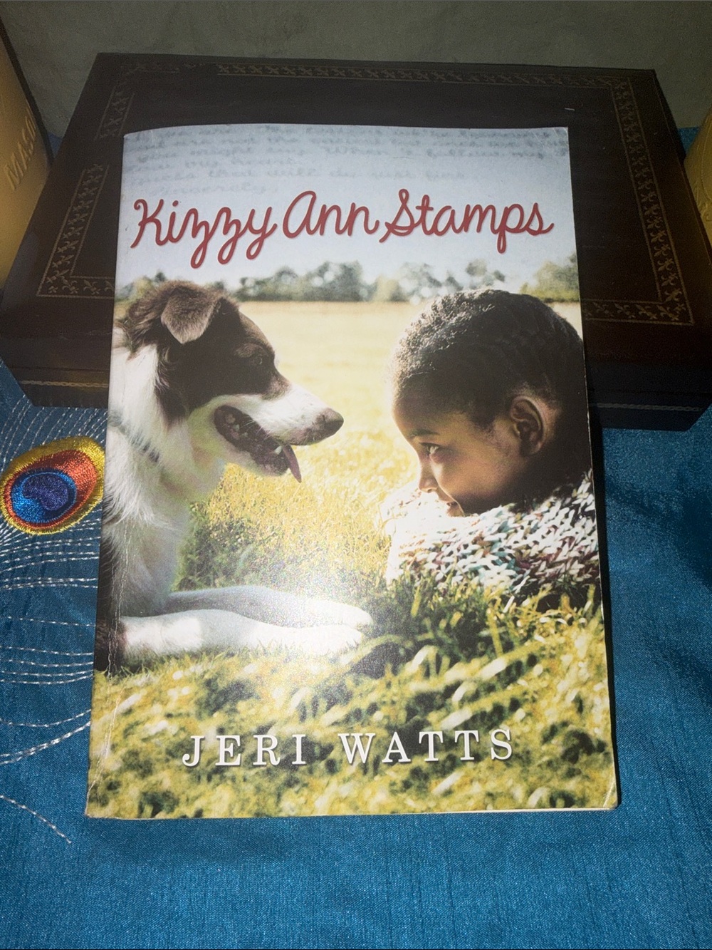 Scholastic Kizzy Ann Stamps — White and Brown Dog on Cover